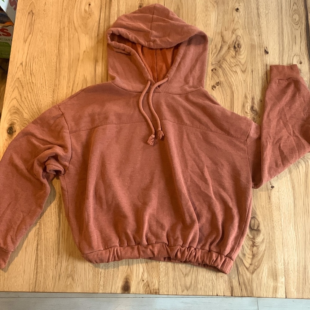 Cropped cinched burnt orange hoodie